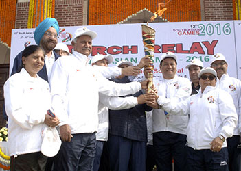 Minister of State for Youth Affairs and Sports Shri Sarbananda Sonowal at lighting of the South Asian Games Torch and the flag off Torch Relay ceremony