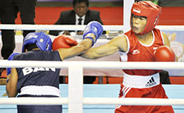 MC Marykom of India defeated Akter Shamina of Bangladesh in Womens Fly48 51 kg weight category
