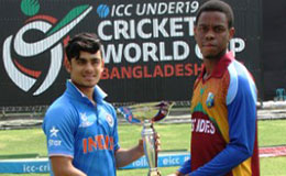 ICC U19 Cricket WC Trophy with India and West Indies Captains