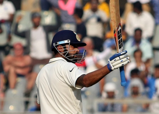 Murali Vijay raises his bat