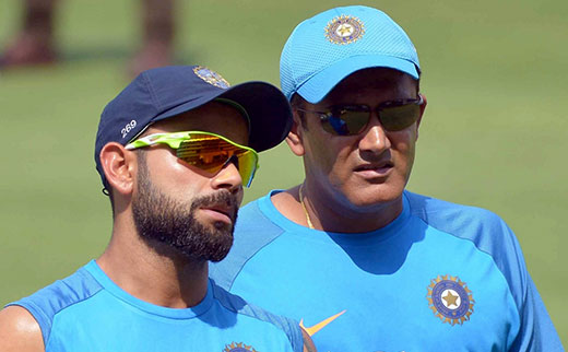 Virat Kohli and coach Anil Kumble during a practice session