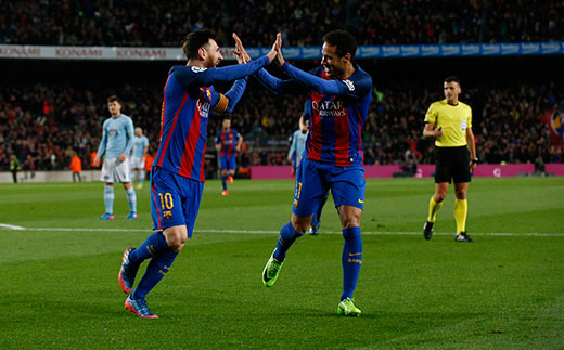 Barcelonas Lionel Messi L celebrates with Neymar after scoring during the Spanish first division soccer match between FC Barcelona and Celta de Vigo