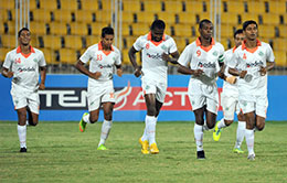 Sporting clube de Goa players celebrate a goal at Nehru Stadium