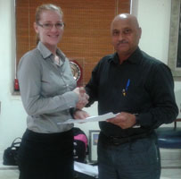 Ms-Elena-Norman-CEO-Hockey-India-handing-over-appointment-letter-to-Mr.-M-K-Kaushik-for-coach-of-the-Senior-Men-Team