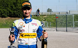 Kush Maini poses with his trophy from his 2nd place finish on the rookie podium at the second round of the Italian F4 Championship at Adria