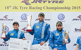 Race winner Anindith Reddy centre 2nd position finishers Ishaan Dodhiwala left and 3rd position finisher Karminder Singh right of Round 2 Race 1 of Volkswagen Vento Cup 2015
