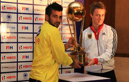 Mnapreet-Singh-Captain-India-and-Mats-Grambusch-Co-Captain-Germany-with-the-Hero-Hockey-Junior-World-Cup-trophy