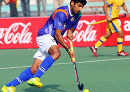UP-Wizards-SK-Uthappa-in-action-against-Jaypee-Punjab-Warriors-in-Lucknow-during-the-Hero-HIL-2014
