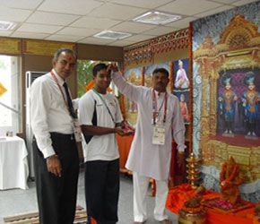 Weightlifter Ravi Kumar offering a prayer