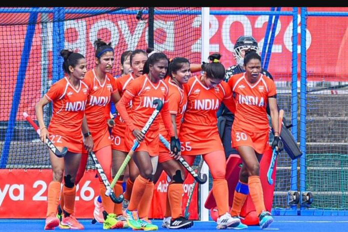 India women's hockey players celebrate a goal in front of the net during their 3-1 win over Japan at the Asian Games 2026 in Kakamigahara