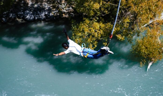 A man in free fall during a bungee jump