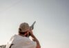 Maharashtra State Shooting Championship: 62 shotgun entries for Pune event without Double Trap Shooter aiming a shotgun at a clay target, representative image for the Maharashtra State Shooting Championship shotgun events