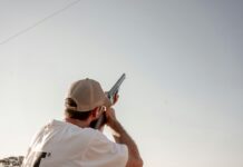 Maharashtra State Shooting Championship: 62 shotgun entries for Pune event without Double Trap Shooter aiming a shotgun at a clay target, representative image for the Maharashtra State Shooting Championship shotgun events