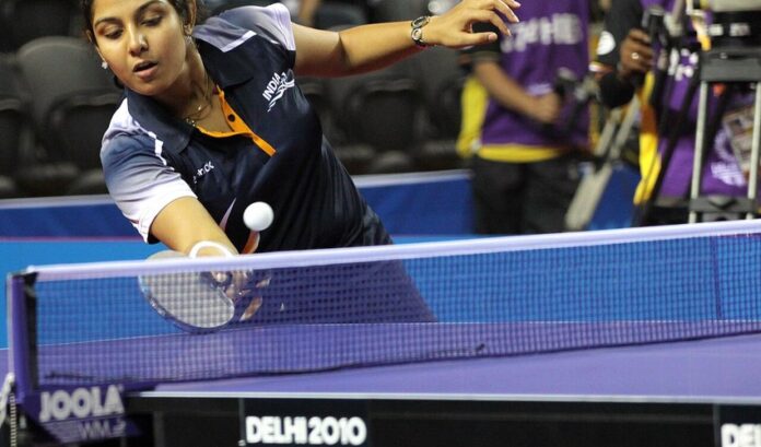 Indian table tennis player Poulomi Ghatak in action at the 2010 Commonwealth Games in Delhi