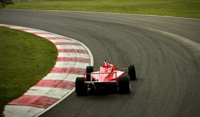 Race car on track Indian National Car Racing Championship Round 1 final day Race car on a circuit, representative image for the final day of Round 1 of the Indian National Car Racing Championship 2026